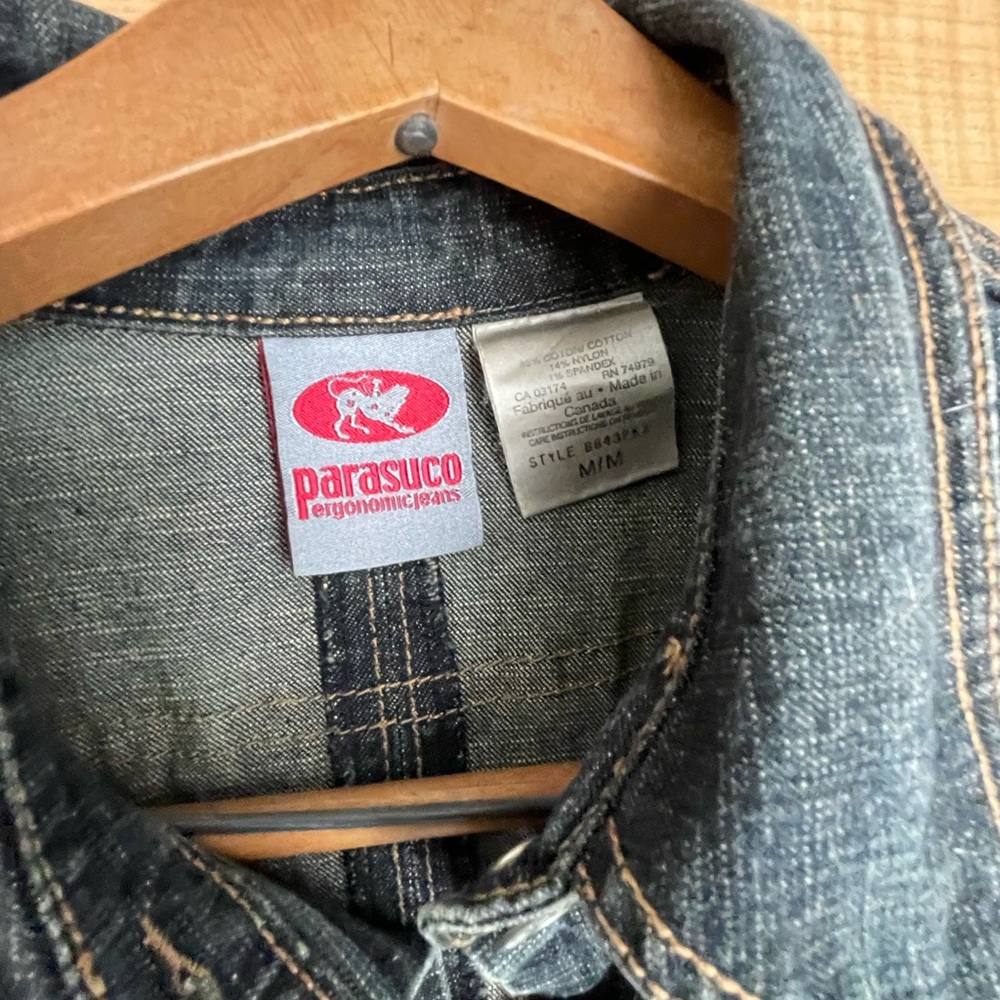 Parasuco long Jean jacket. Size medium. Leather ties on the wrist.